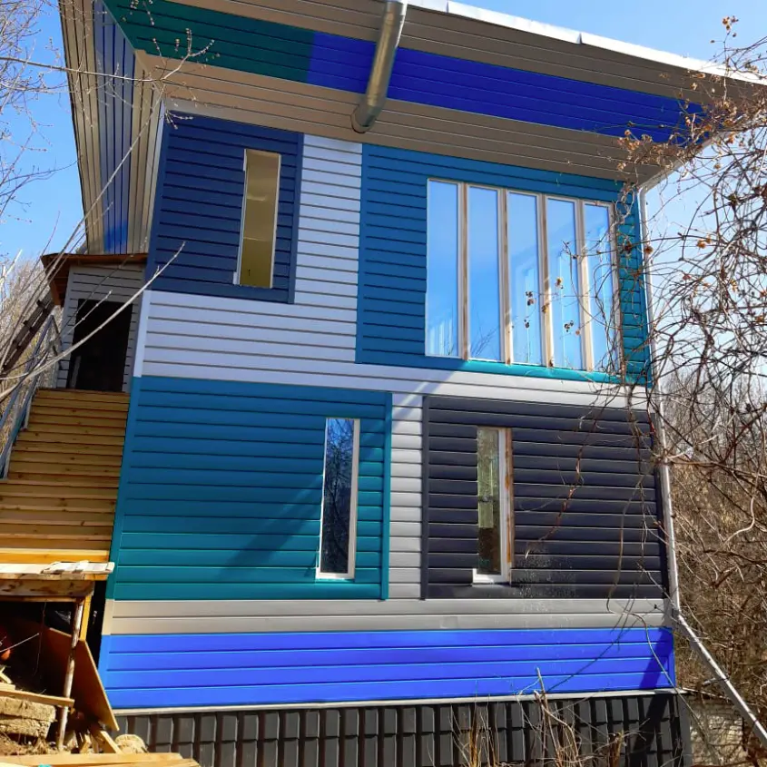 Фото 6 дома Перевертыш металлосайдинг Евро-Брус под брус в ассортименте